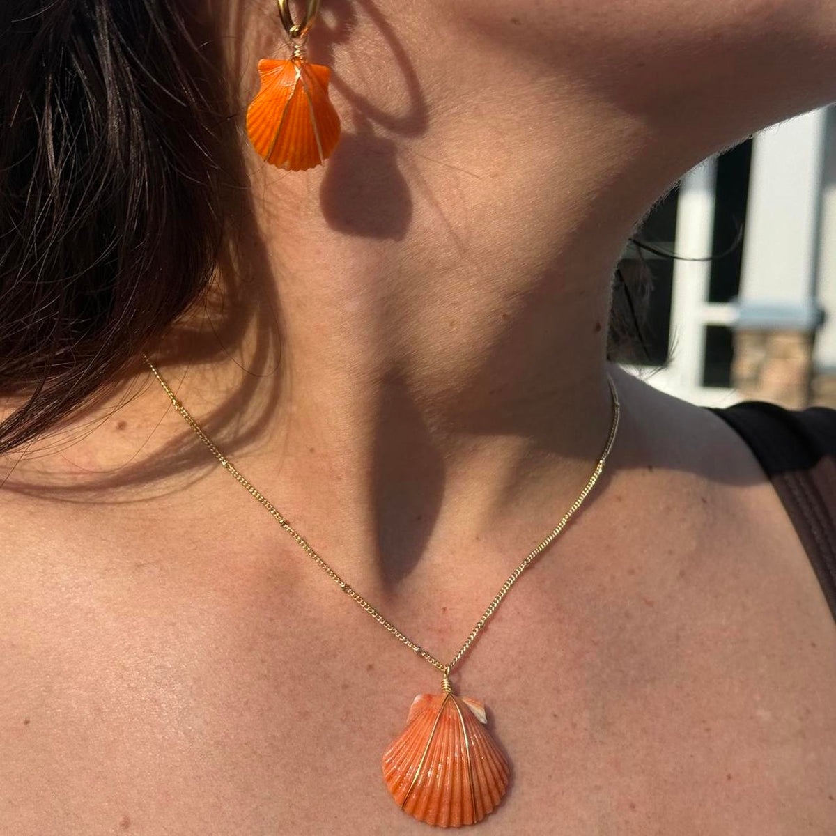 Coastal Ember matching shell jewelry set worn