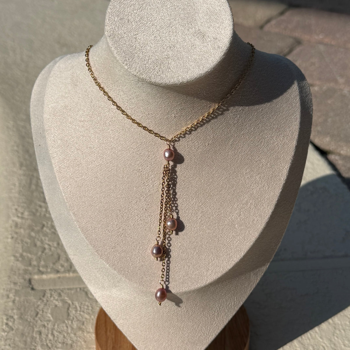 Pearl Cascade Necklace in pink pearl colorway