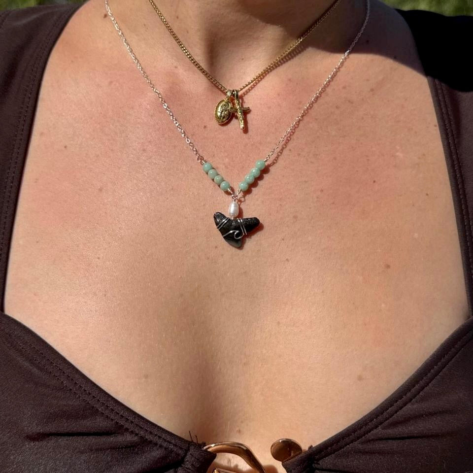 Mint-green bead shark tooth necklace shown worn