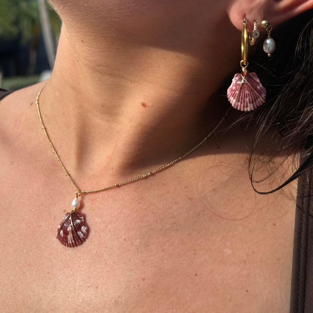 Burgundy scallop necklace and matching earrings styled together