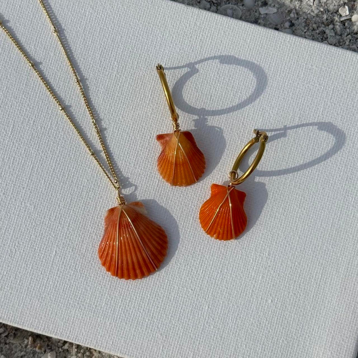 Coastal Ember necklace and earrings set displayed together
