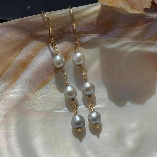 Gray pearl drop earrings in gold