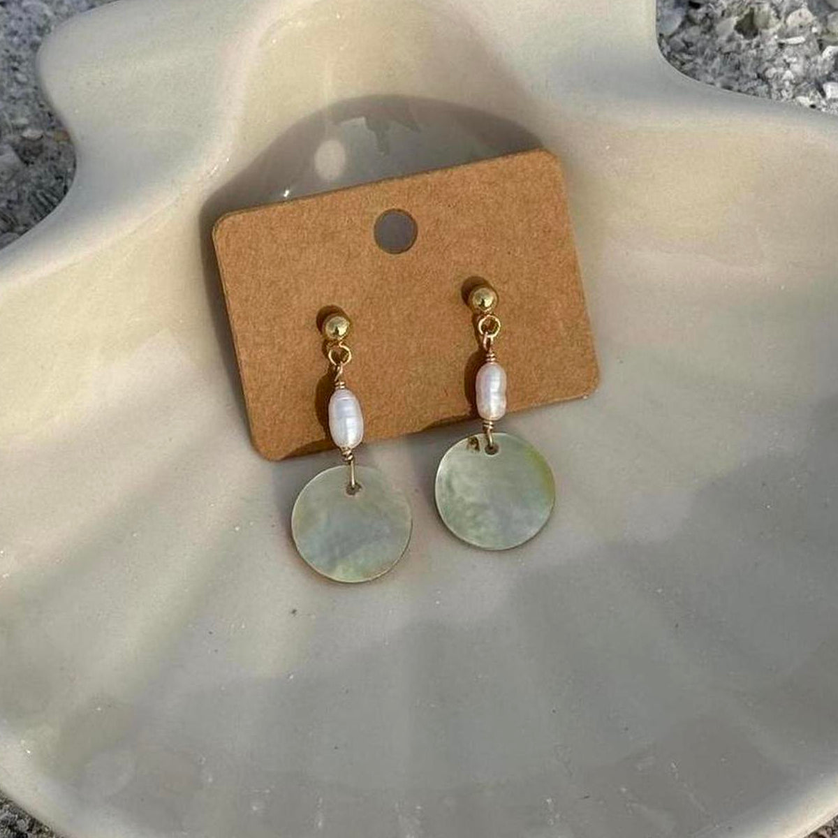Pearl Tide Earrings in gold with freshwater pearls and mother-of-pearl discs