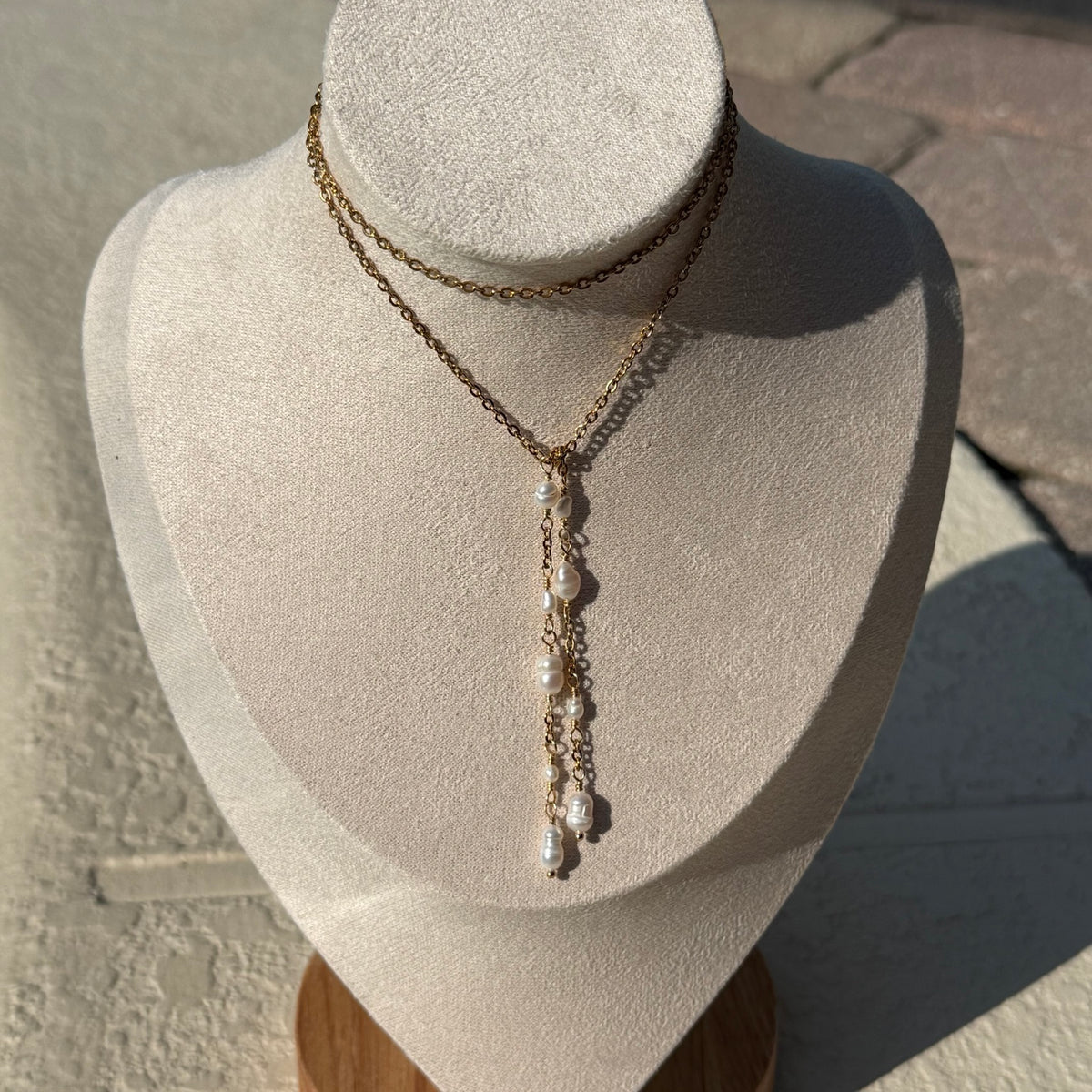 Pearl Wrap Lariat Necklace styled in a tied lariat look