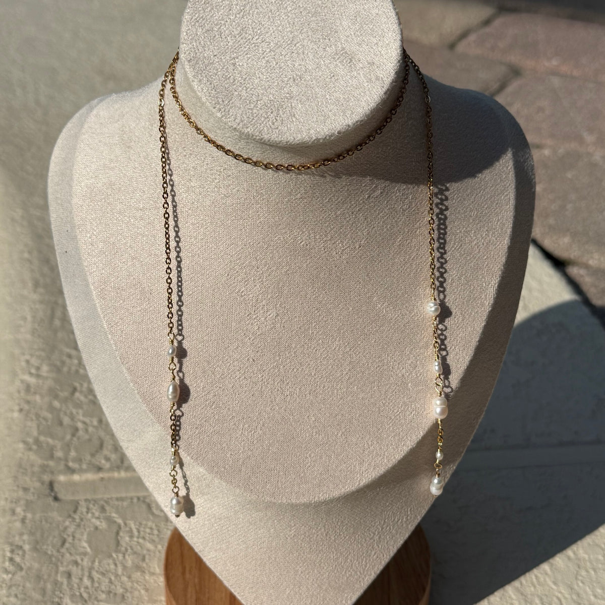 Pearl Wrap Lariat Necklace worn long with pearl accents