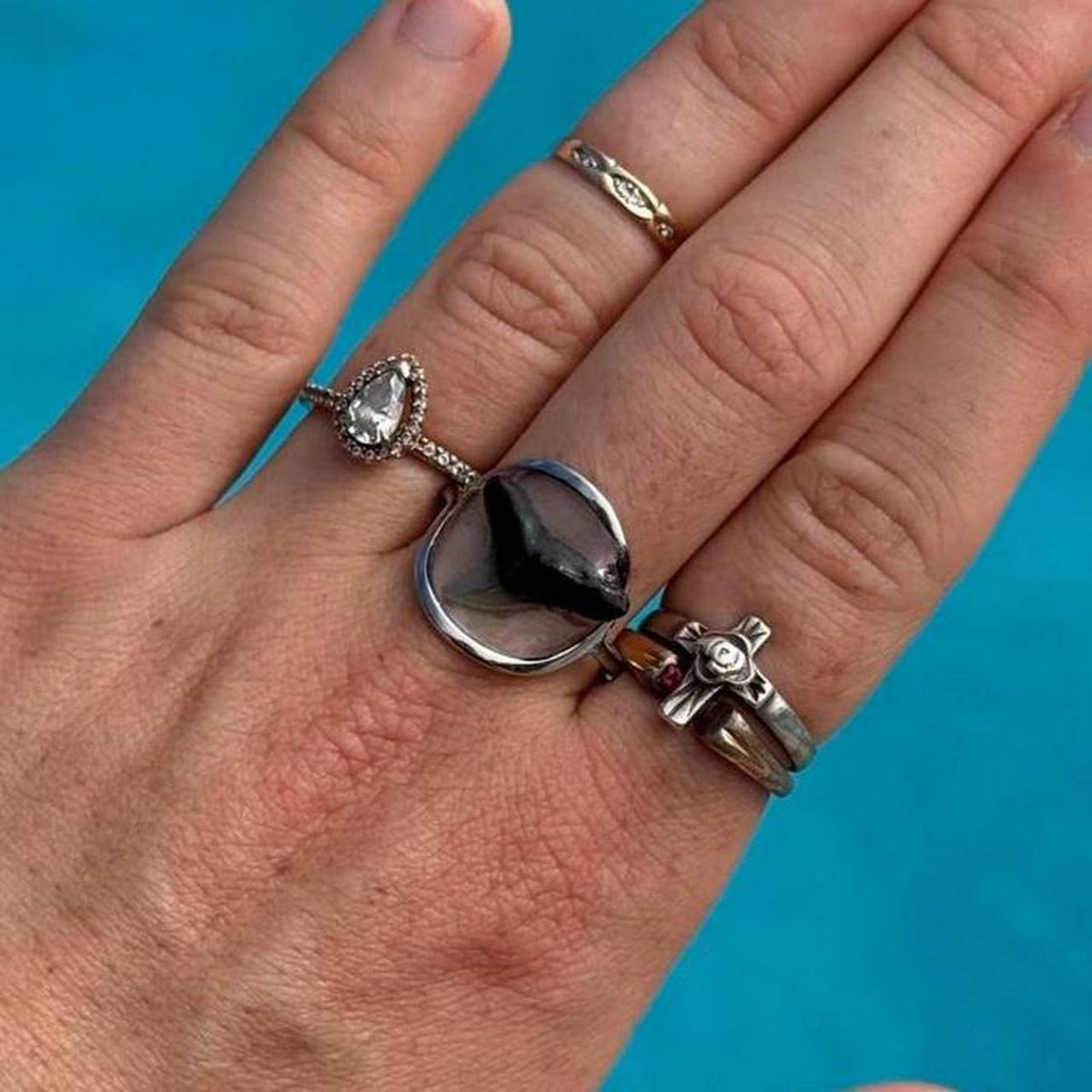 Silver shark tooth statement ring styled on hand