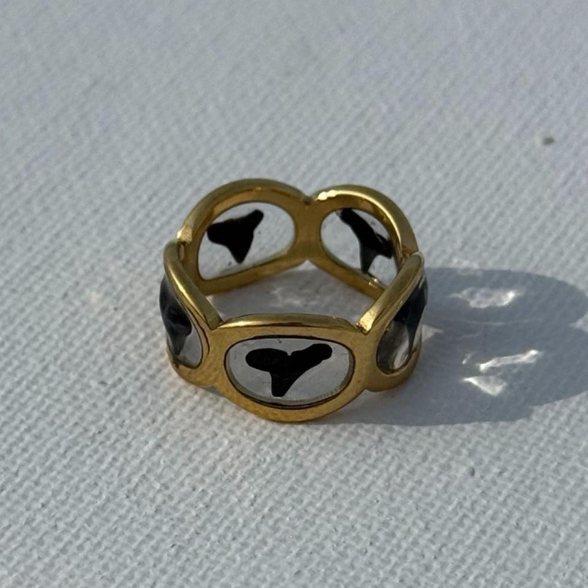Gold shark tooth resin band ring with multiple genuine shark teeth