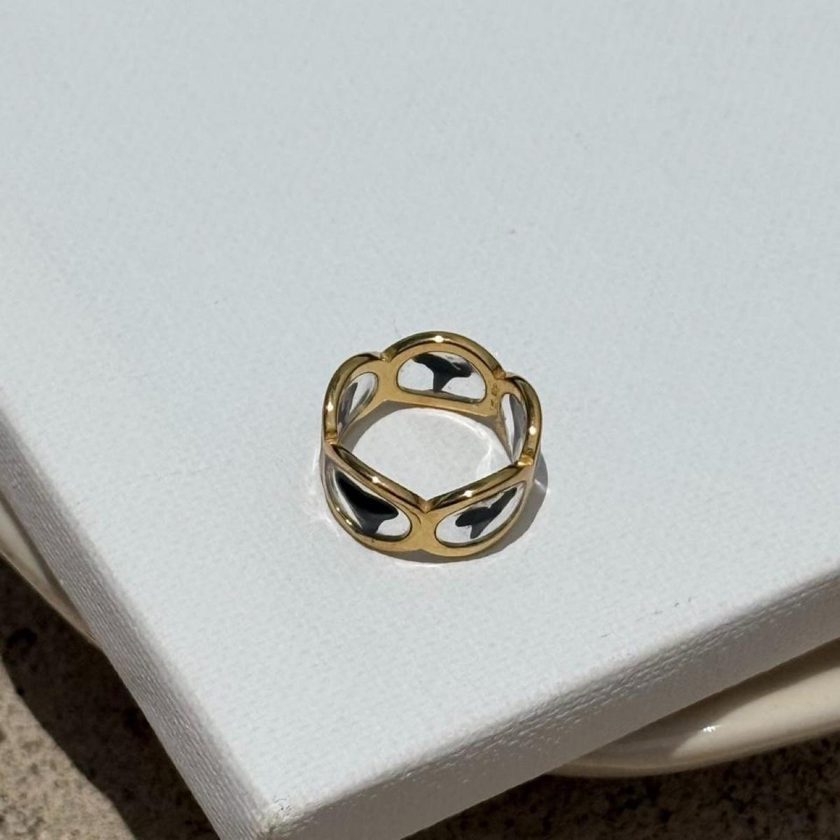 Top view of shark tooth resin band ring