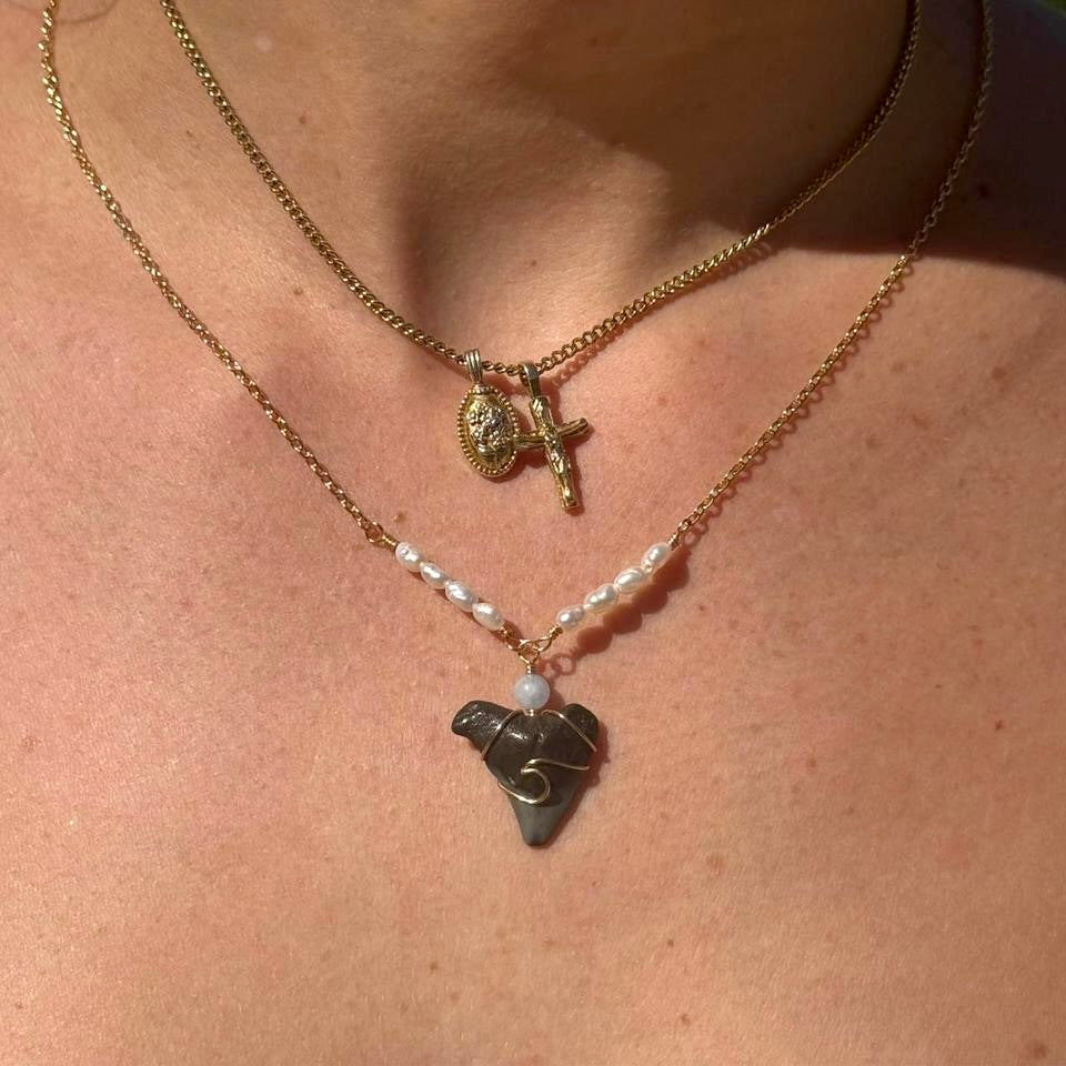 Close worn view of Pearl Tide Shark Tooth Necklace