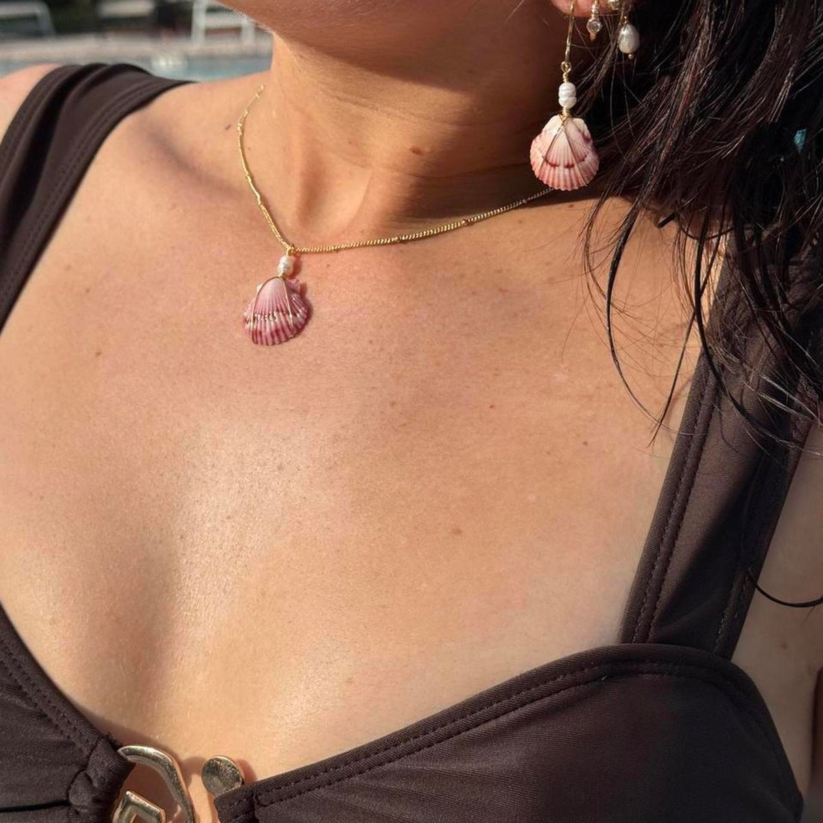 Rosewater Scallop Set necklace and matching earrings worn in sunlight