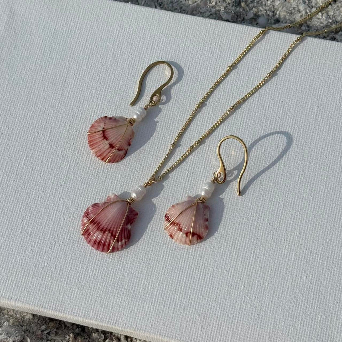 Rosewater Scallop Set necklace and earrings displayed together