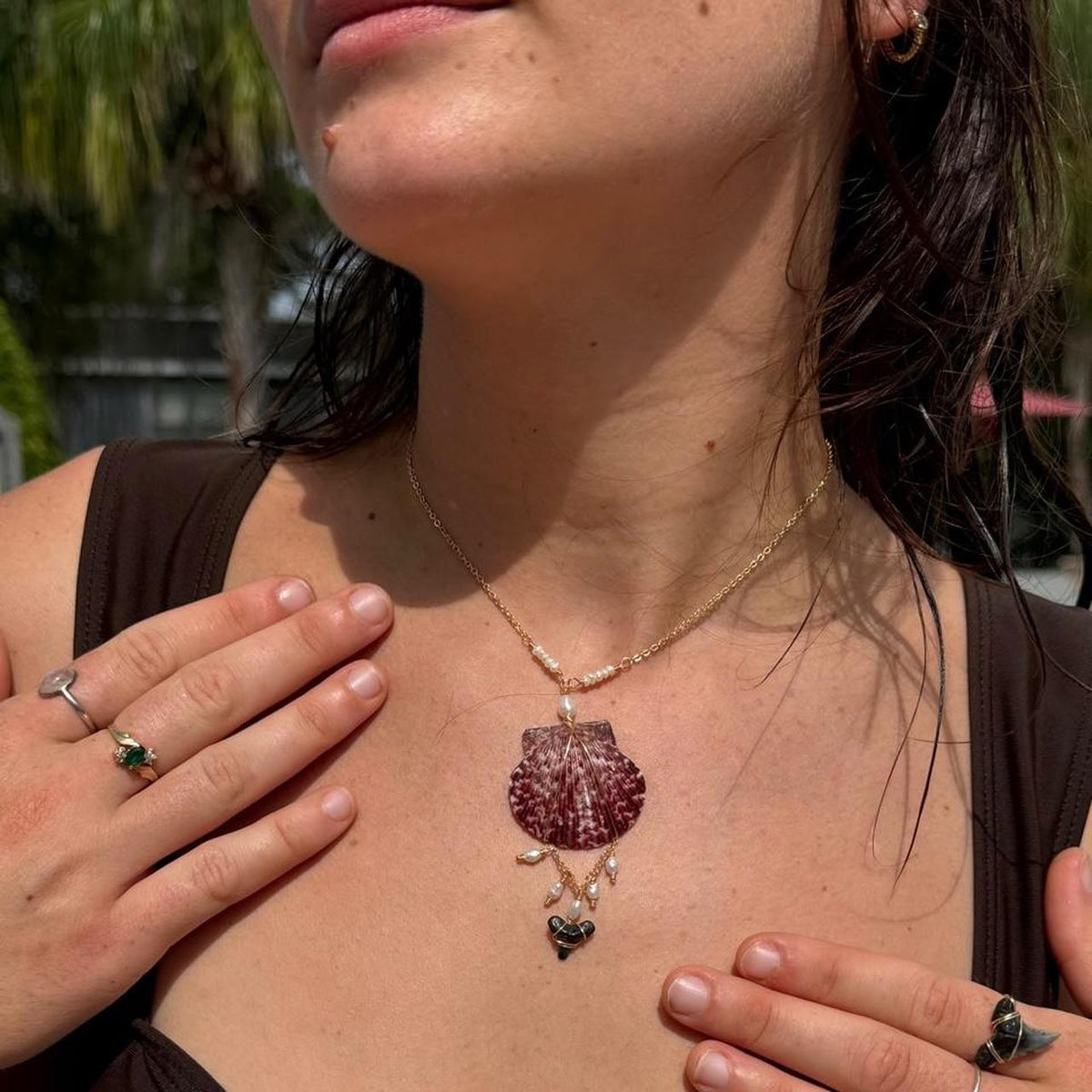 Statement scallop shell necklace shown for scale