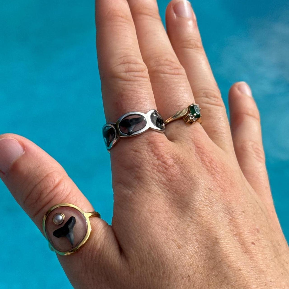 Size 10 shark tooth ring worn on hand